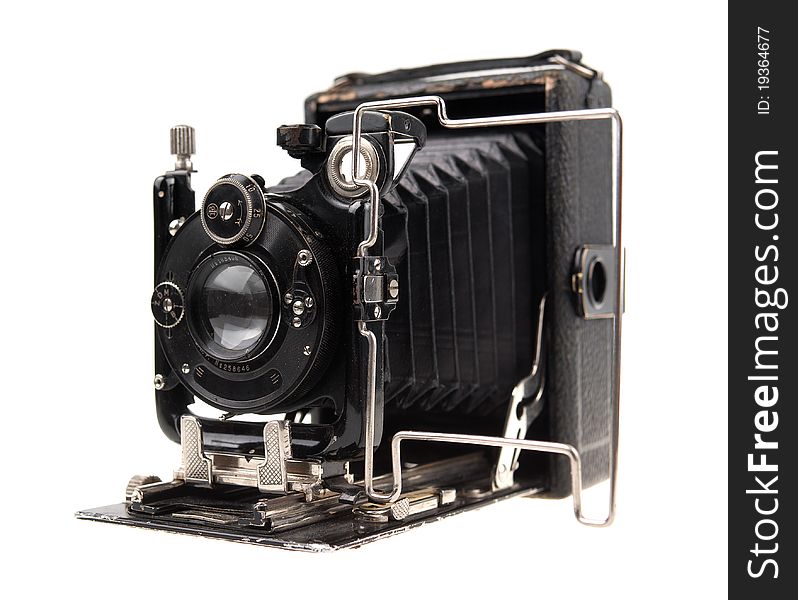 Old-time photo camera on white background. Old-time photo camera on white background