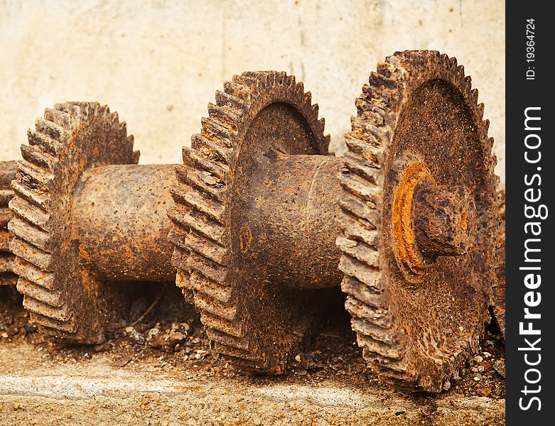 The gears on the old cement. The gears on the old cement