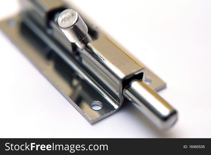 Latch on a white background, macro image