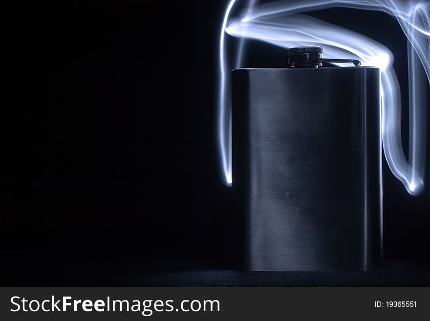 Glass vessels standing on the white table, isolated background