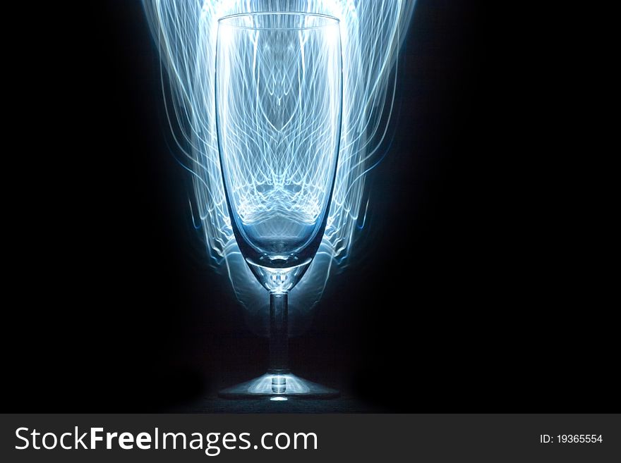 Glass vessels standing on the white table, isolated background