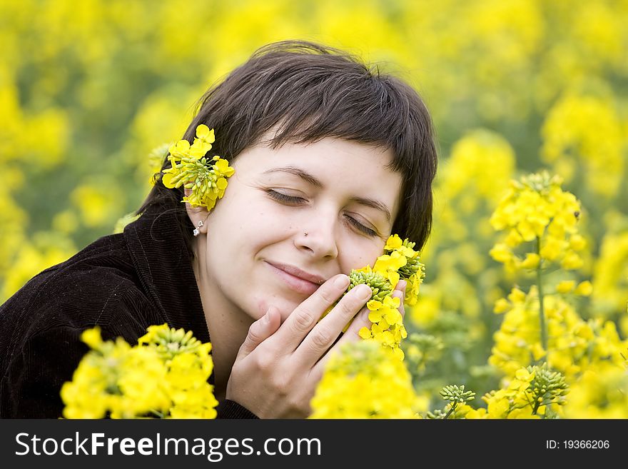 Casual girl enjoying summer in a beautiful field. Casual girl enjoying summer in a beautiful field