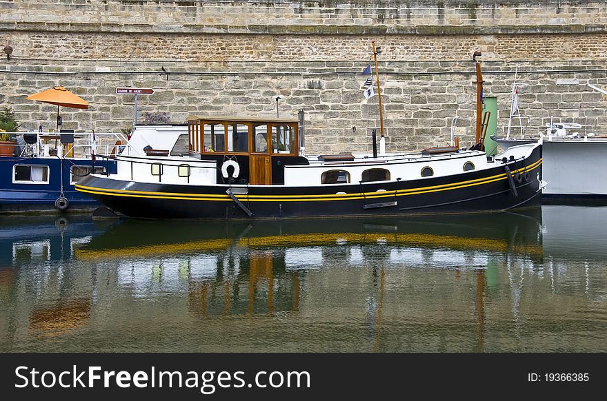 Barge on the banks of the River Seine.