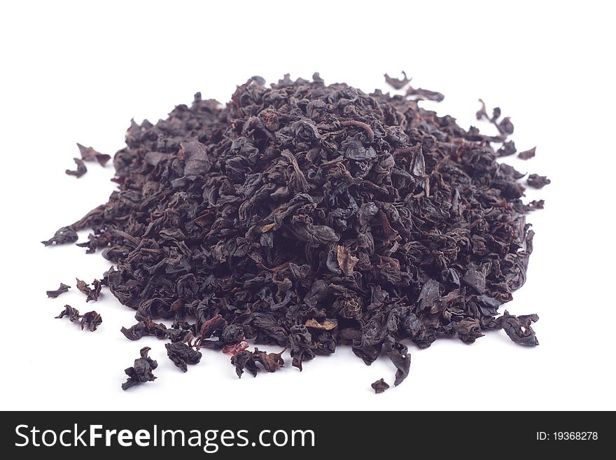 Heap of forest fruits tea isolated over white background.