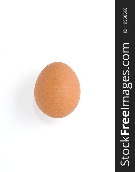 A chicken's egg on a white background. A chicken's egg on a white background