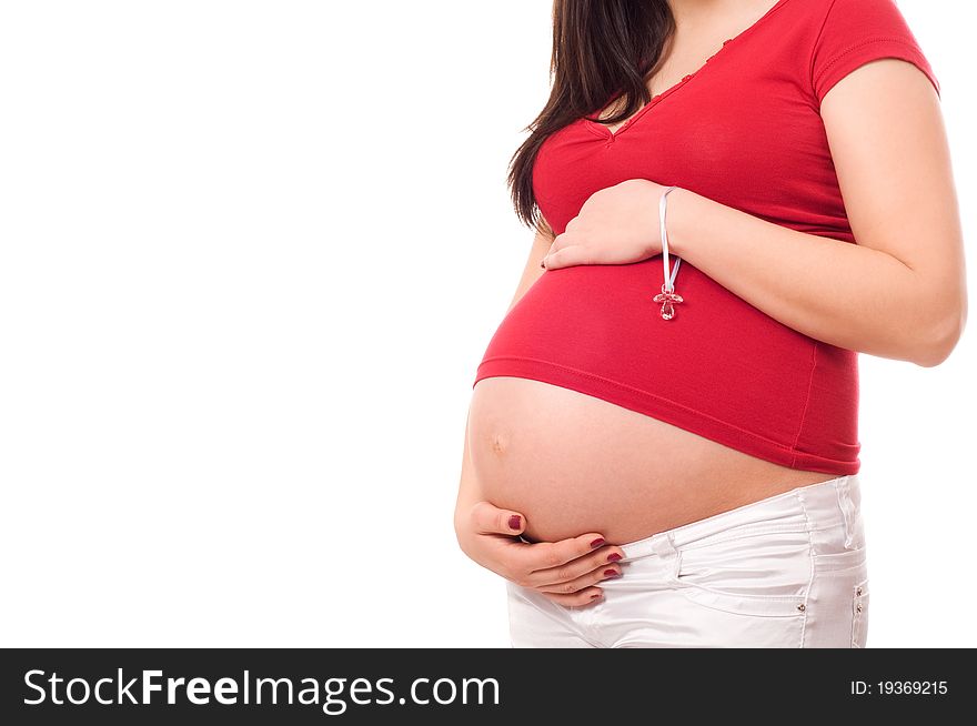 Pregnant woman holding belly over white background