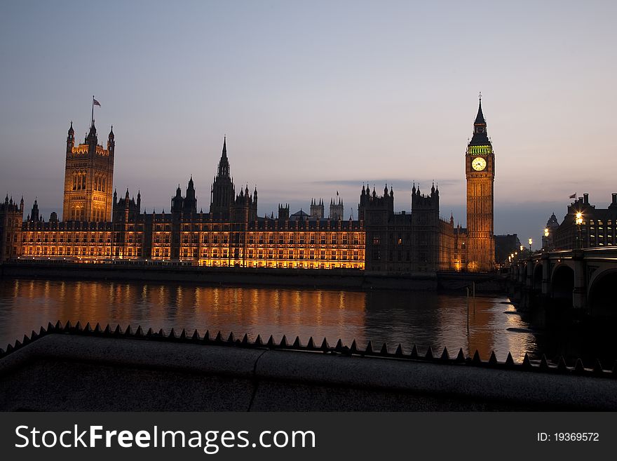 Houses of Parliament in Westminster Illuminated at Night in London, England, UK. Houses of Parliament in Westminster Illuminated at Night in London, England, UK