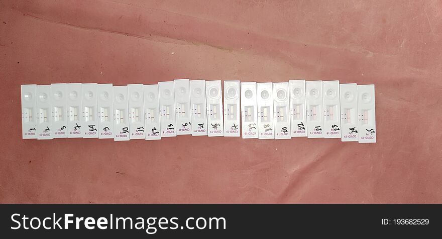 Corona virus Covid19 rapid antigen testing kit under observation after swab collection and test on the table numbered arranged..