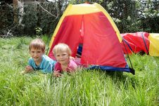 Young Brother And Sister In Colorful Tent Stock Photos Young Brother And Sister In Colorful Tent Stock Photos