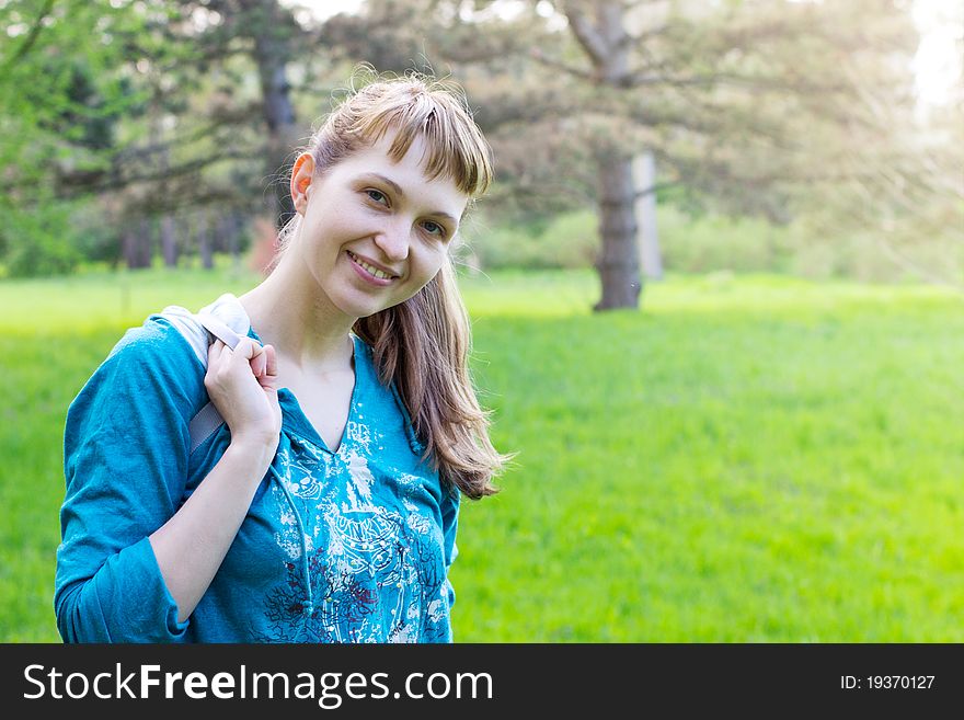 Single beautiful woman relaxing at the park. Single beautiful woman relaxing at the park