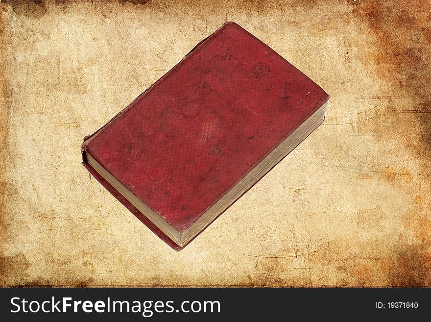 Old red book isolated on a white background