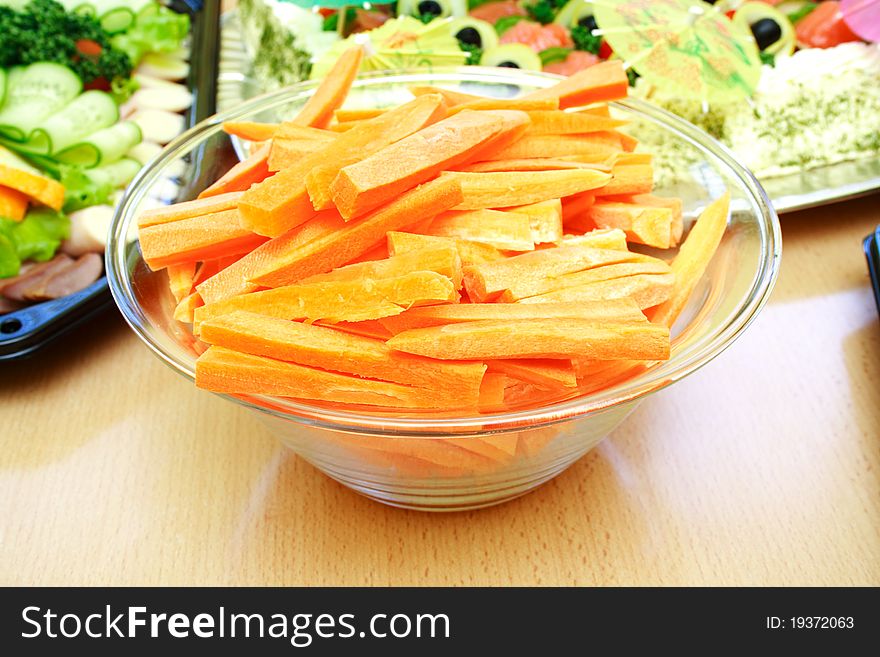 Close view of fresh sliced carrots on the table