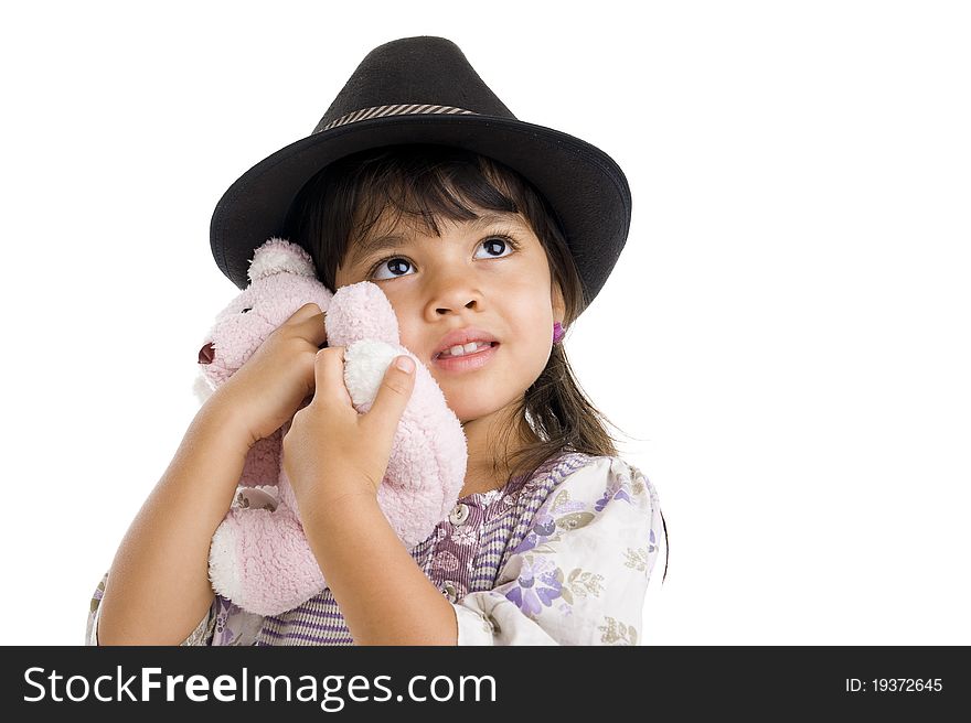 Cute girl with hat hugging her teddy bear isolated on white background. Cute girl with hat hugging her teddy bear isolated on white background