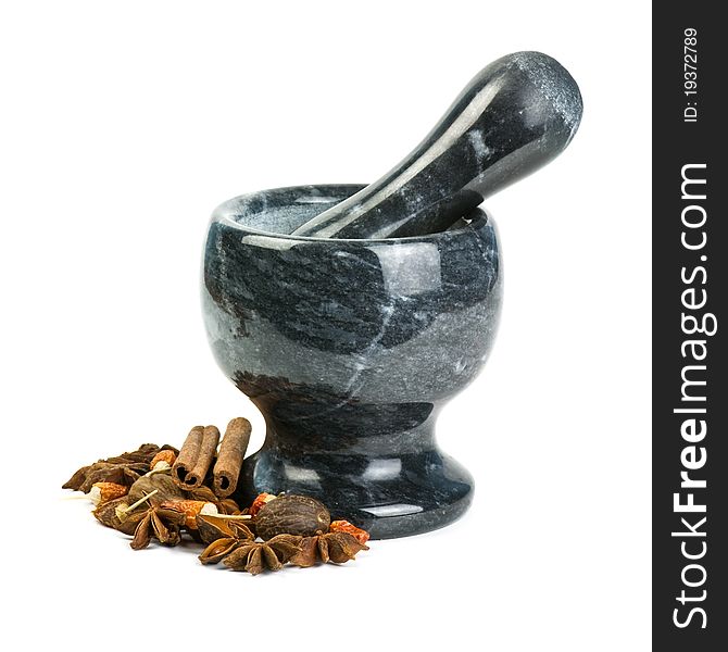 Marble mortar with spices isolated