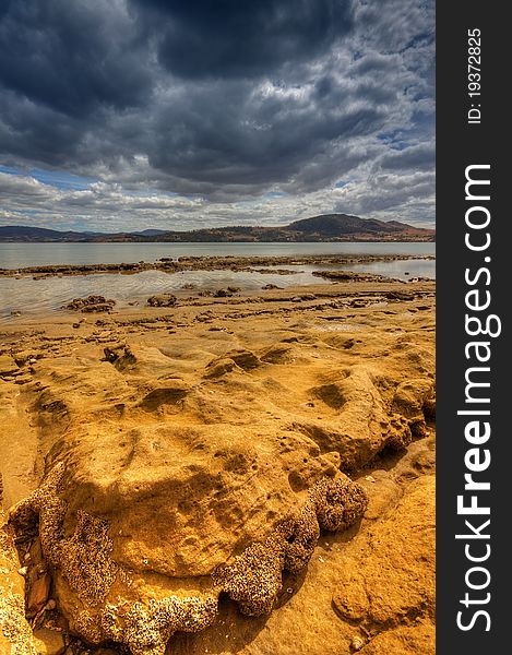 Sandstone formations on the beach, Midway Point, Tasmania. Sandstone formations on the beach, Midway Point, Tasmania.