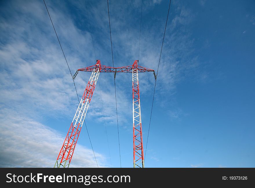 Electric pylons and wires on the cloudy sky. Electric pylons and wires on the cloudy sky