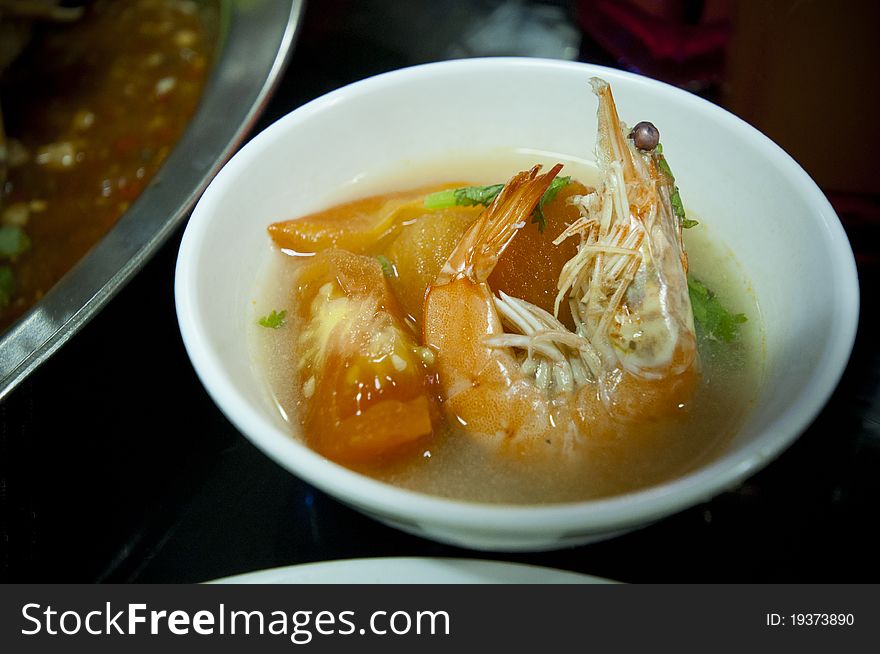 Prawn soup served as one of the side dish