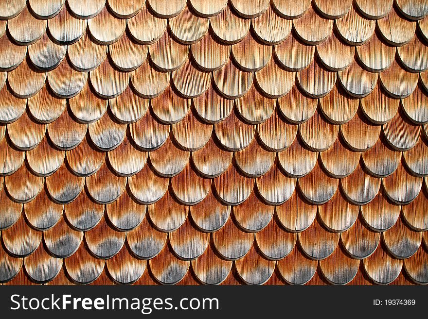 Wooden tiles on house in austrian alps