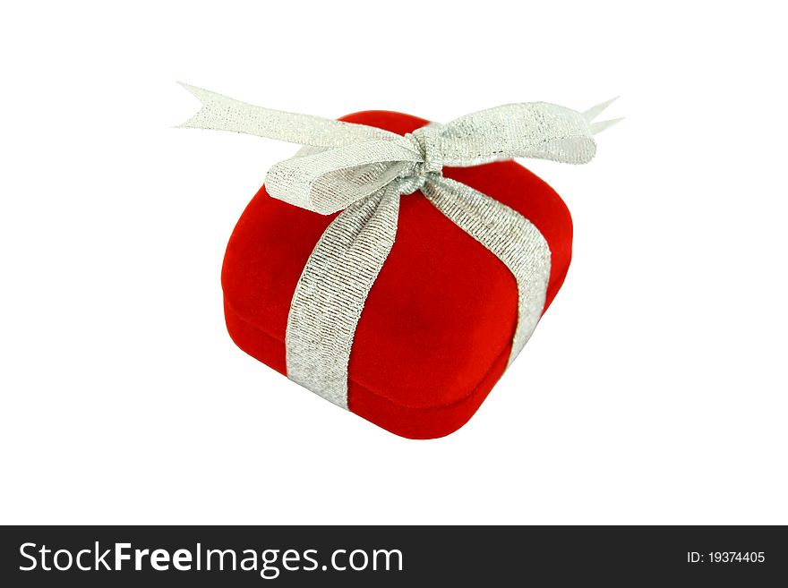 Red gift box with silver ribbon isolated on white background. Red gift box with silver ribbon isolated on white background