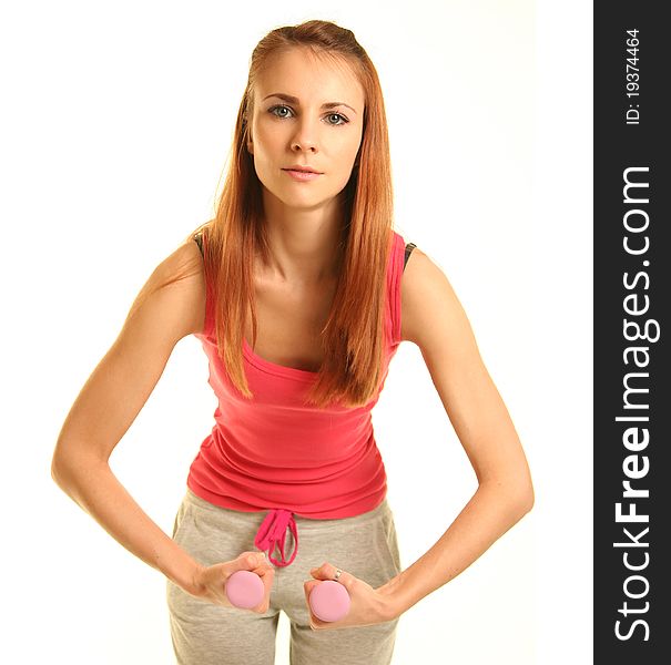 Beautiful young woman working out. Beautiful young woman working out