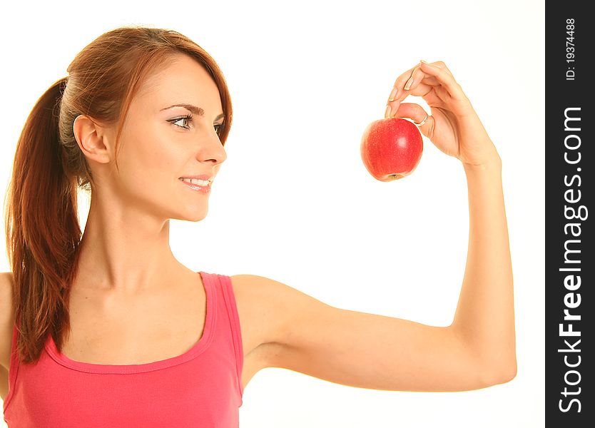 Healthy young woman with apple