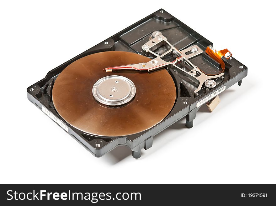 One old opened harddisk with scratches and dust isolated on white. One old opened harddisk with scratches and dust isolated on white