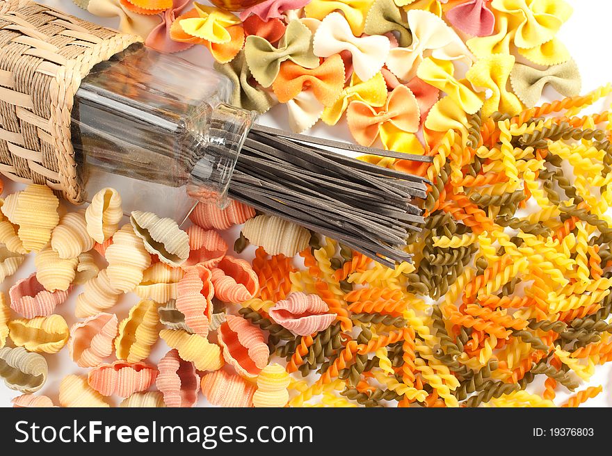 Different kinds of italian pasta on white background