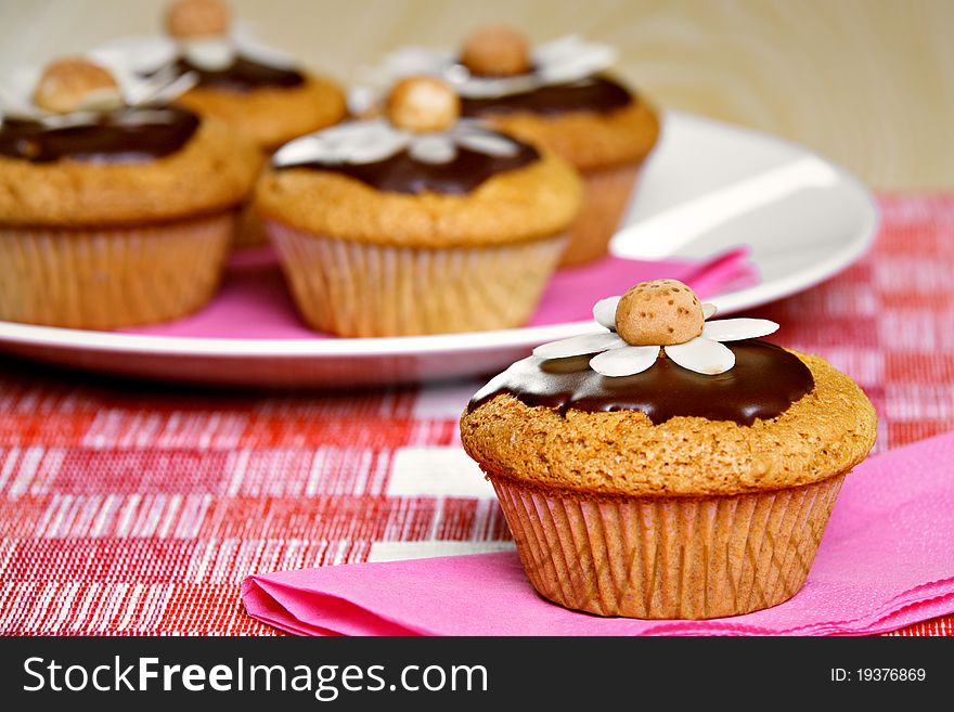 Five muffins on the table. Five muffins on the table