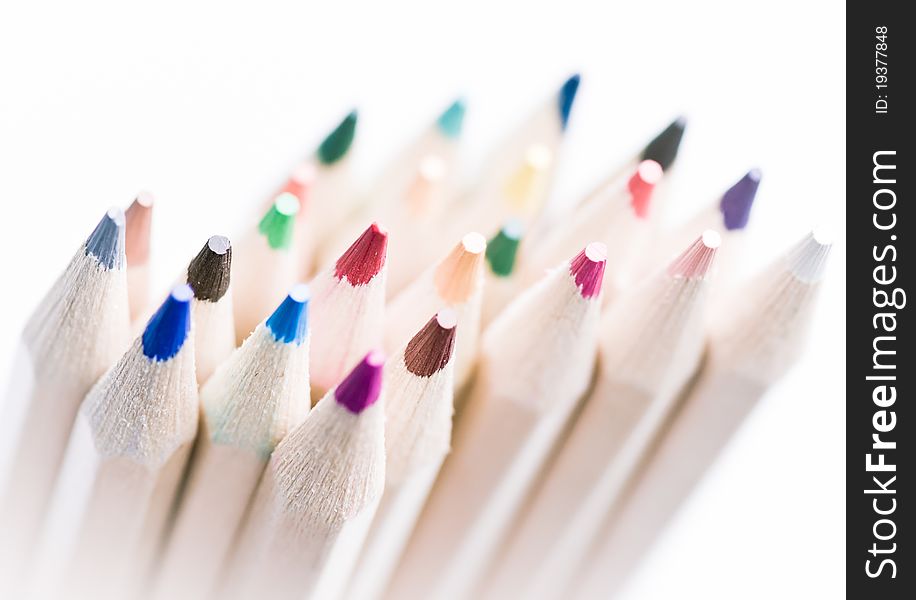Colorful pencils bundled, on white background