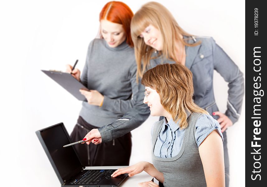 Women are working on a computer on a white background
