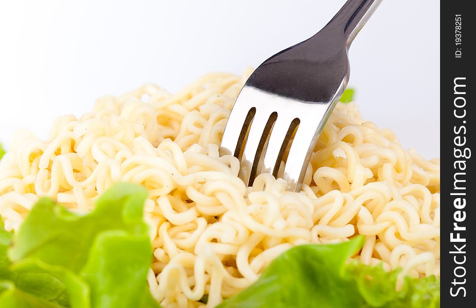 Vermicelli and lettuce. Isolated on a white bachground