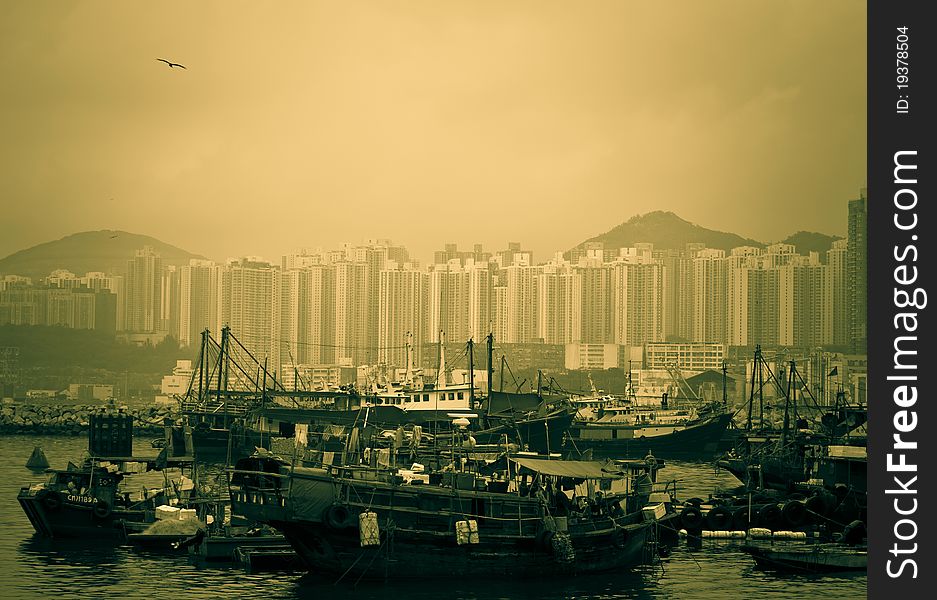 A scene of Hong Kong Typhoon Shelter with boats, sampans and ships.
