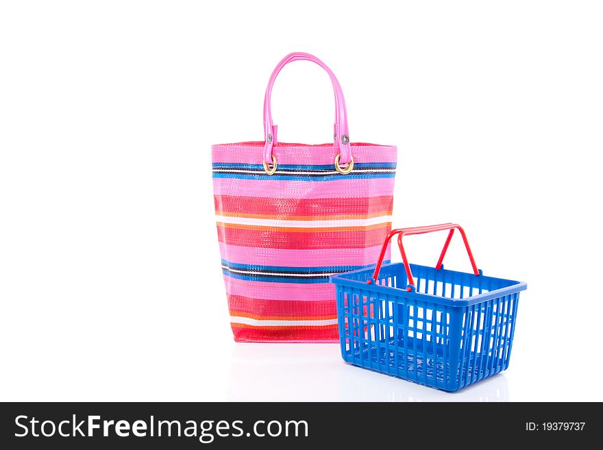 A shopping basket and a shopping bag isolated over white. A shopping basket and a shopping bag isolated over white