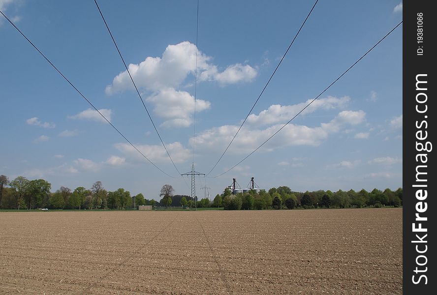 High voltage power line in an rural scenery. High voltage power line in an rural scenery