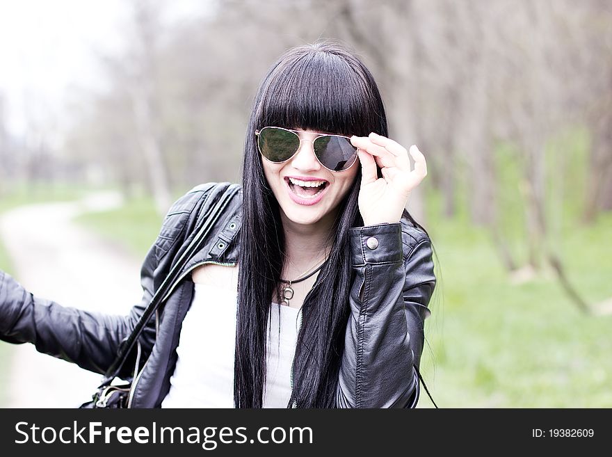 Beautiful Young Woman Wearing Sunglasses