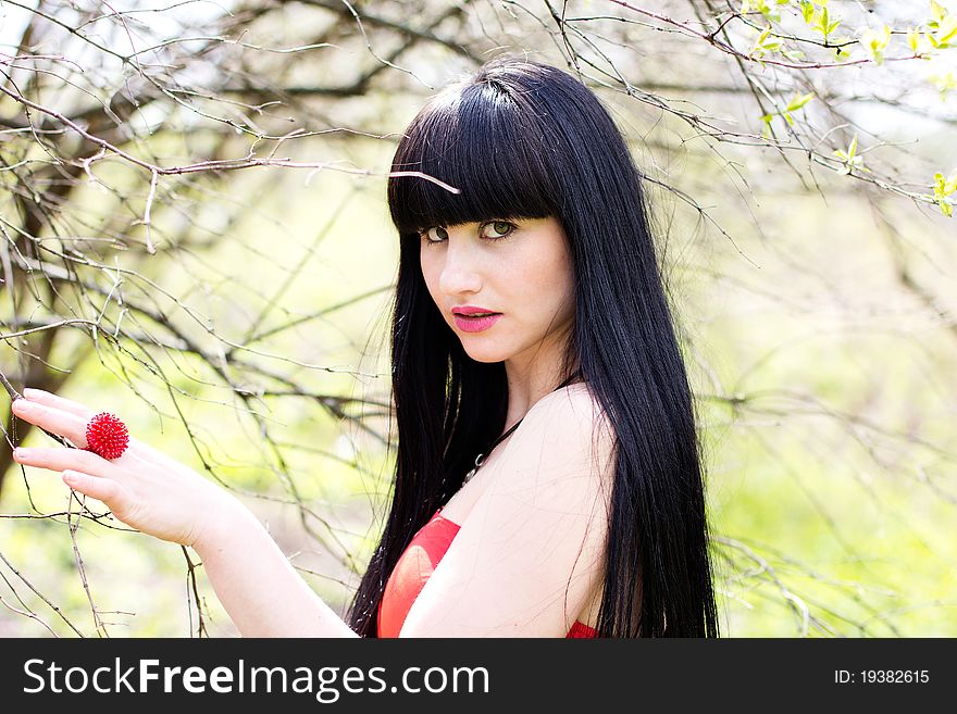 Beautiful young woman relaxing at the park