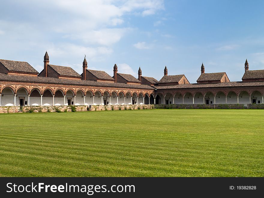Carterhouse of Pavia, cell complex over a grass field