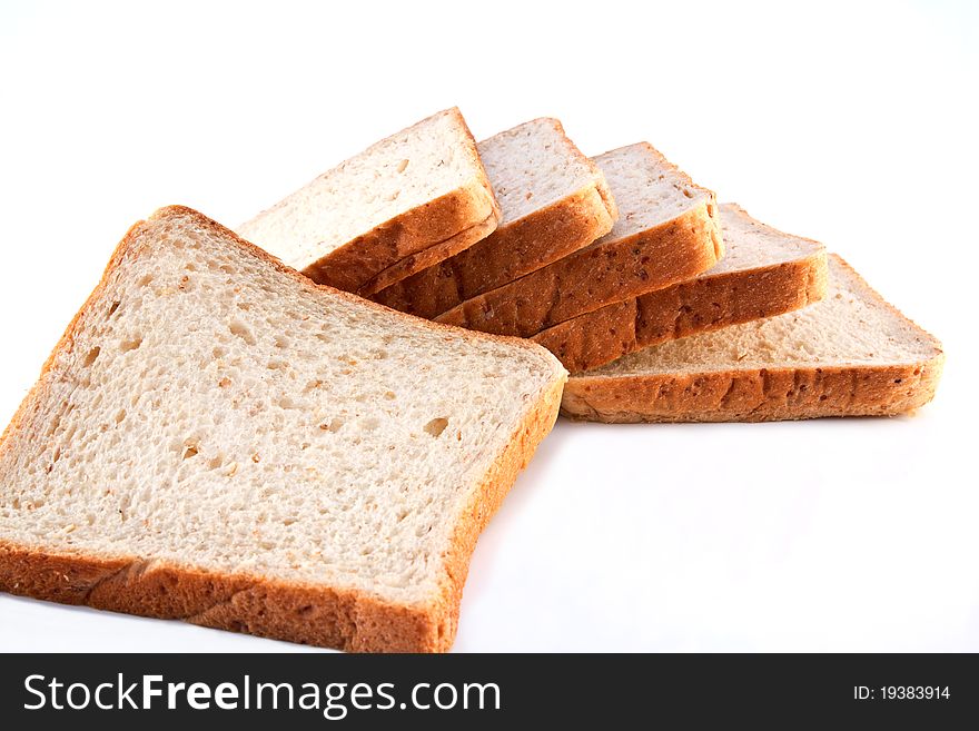 Whole wheat bread isolated on white