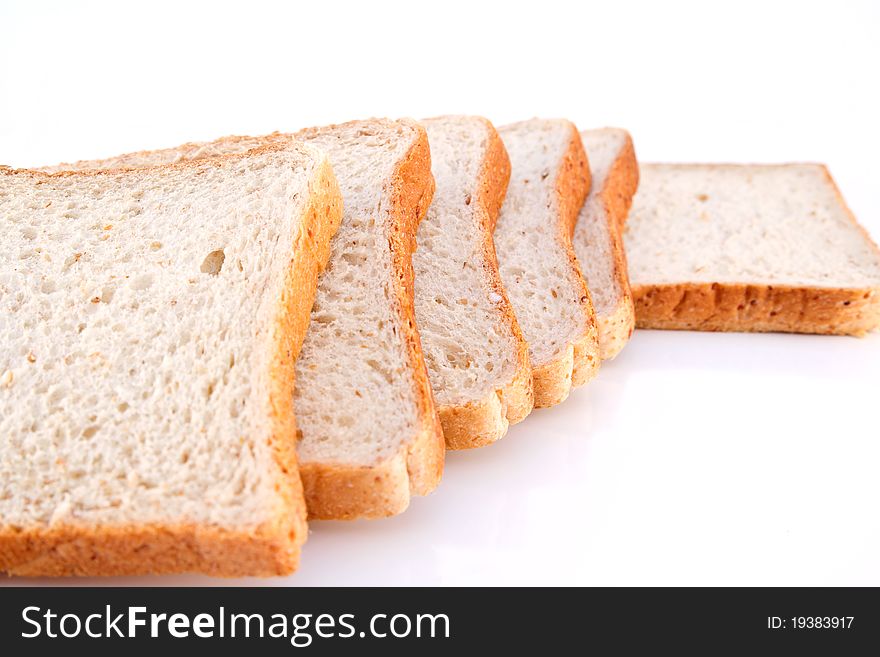 Whole wheat bread isolated on white background