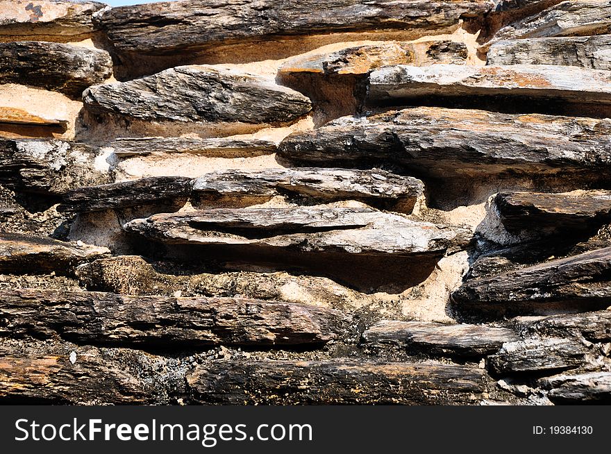 The close-up of the rough stone texture