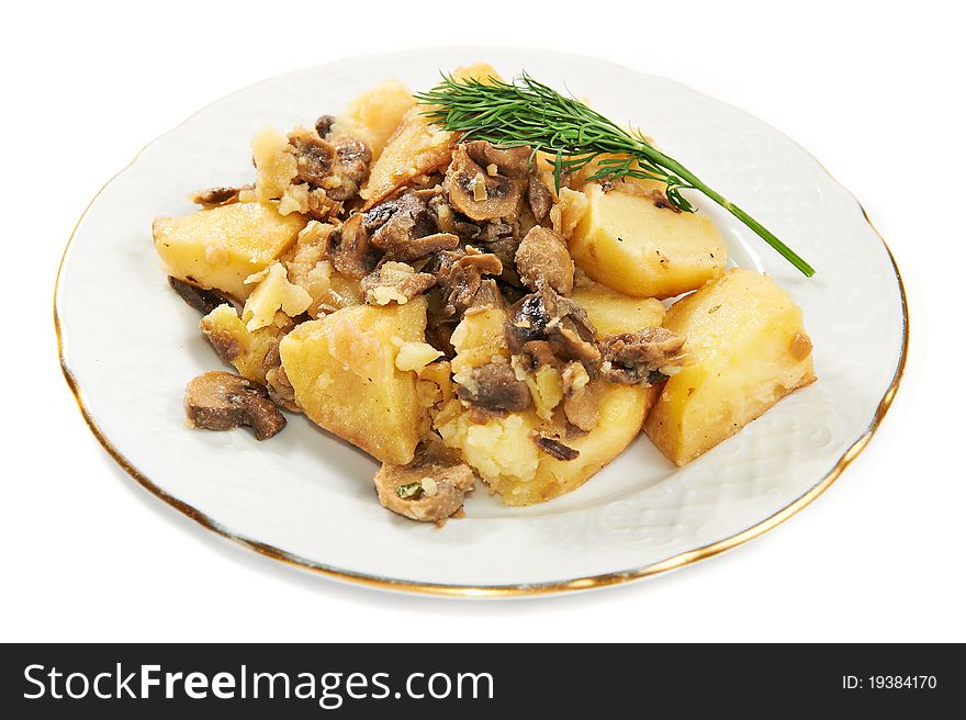 Boiled potatoes with mushrooms isolated on plate on white background