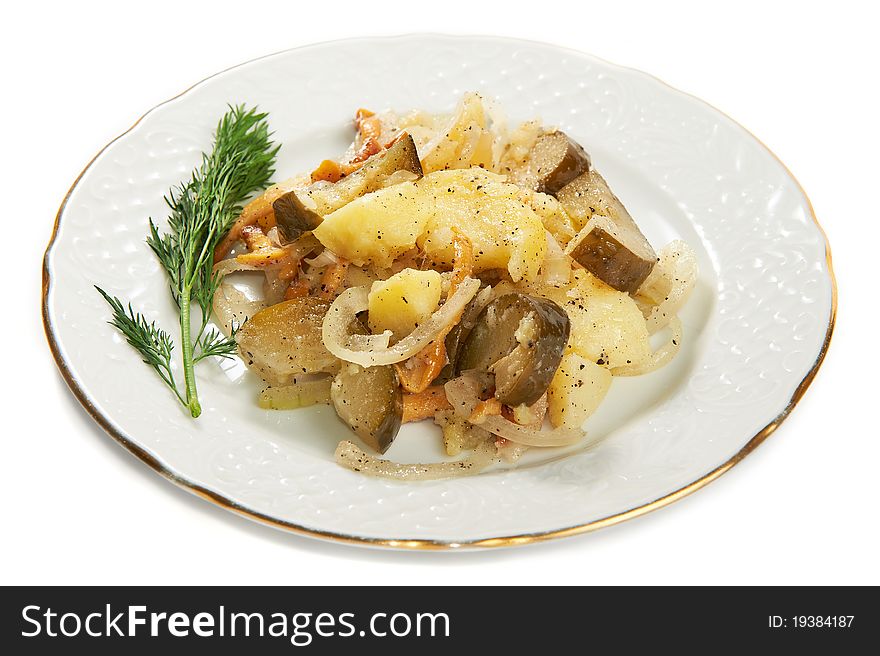 Boiled potatoes with with pickles isolated on plate on white background