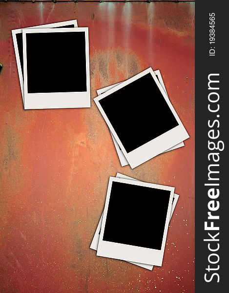 Three Blank Photos on Metal Background