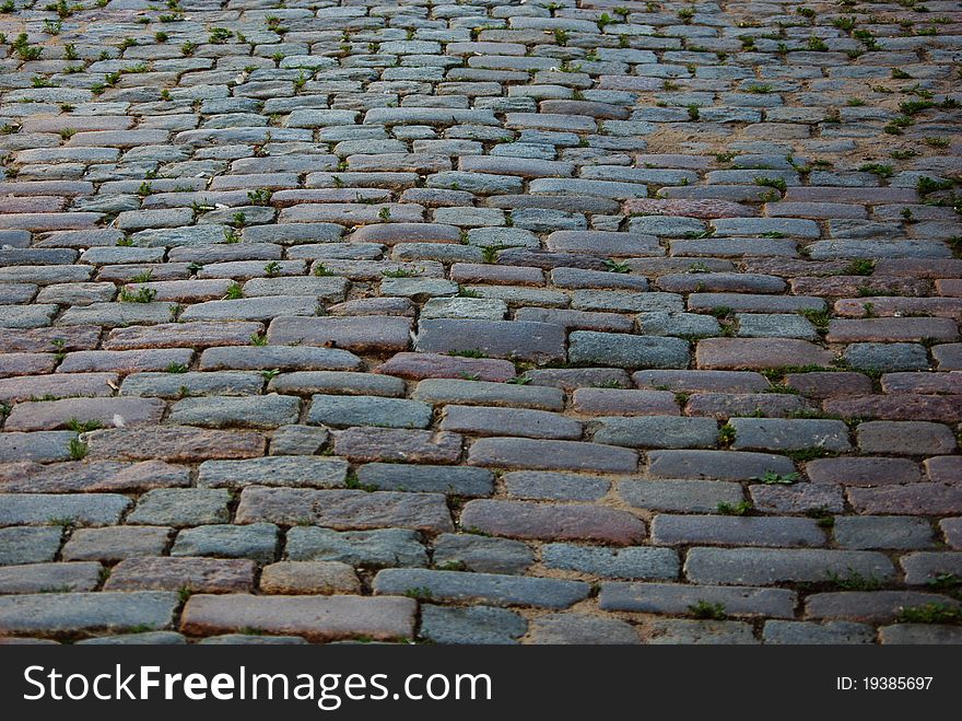 Old stone pavement background in Riga, Latvia