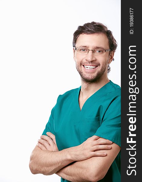 Smiling surgeon on white background