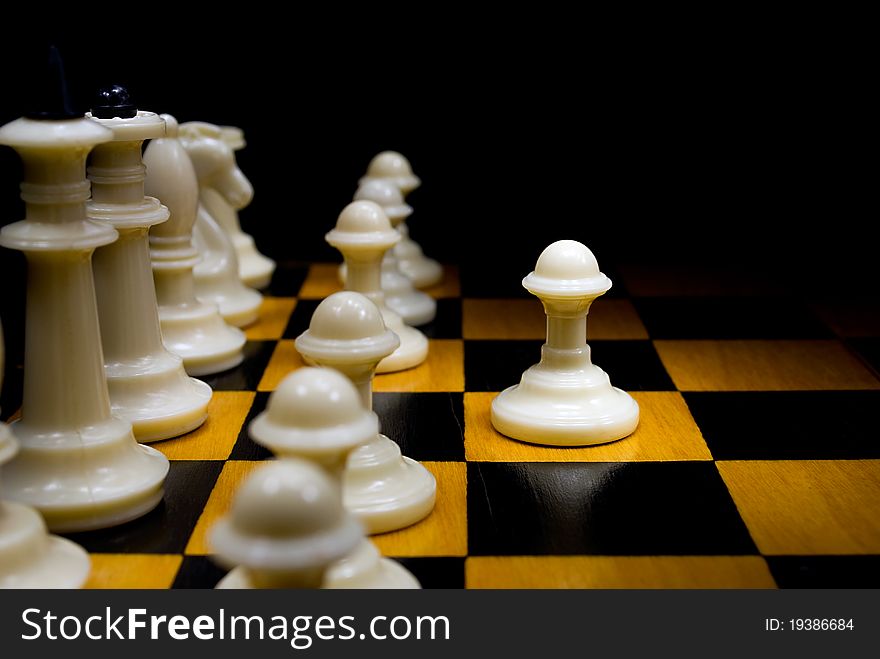 Chess pieces on a chessboard, close-up