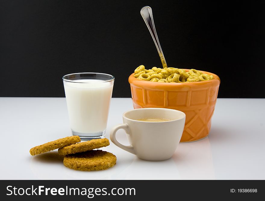 Breakfast cereals with milk and coffee