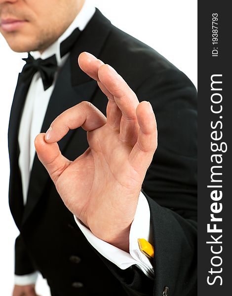 Man making 'ok' gesture over white