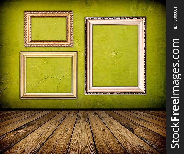 Vintage green interior with empty frame hanging on the wall. Vintage green interior with empty frame hanging on the wall