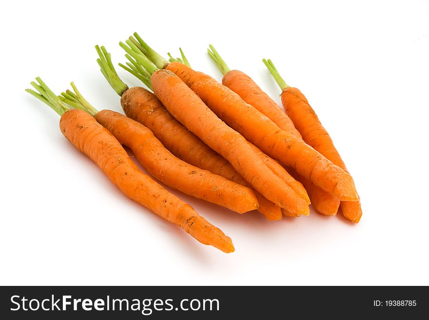 Pile of carrots isolated over white. Pile of carrots isolated over white